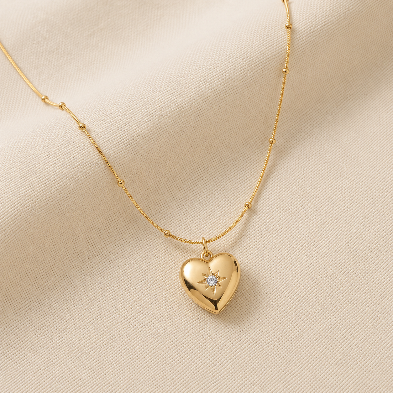 Gold Plated Starburst Heart Pendant Necklace | Elegant Beaded Chain